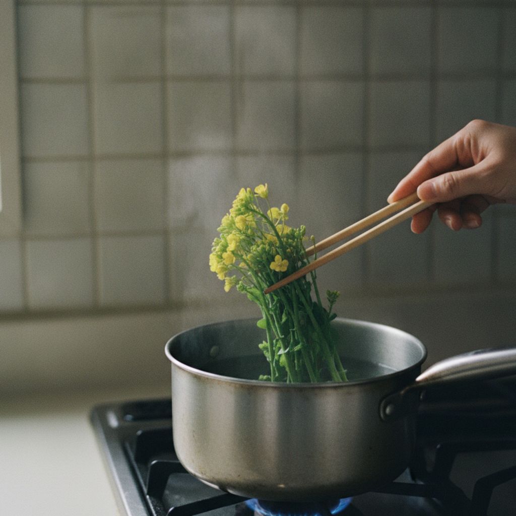熱湯で菜の花を茹でる様子